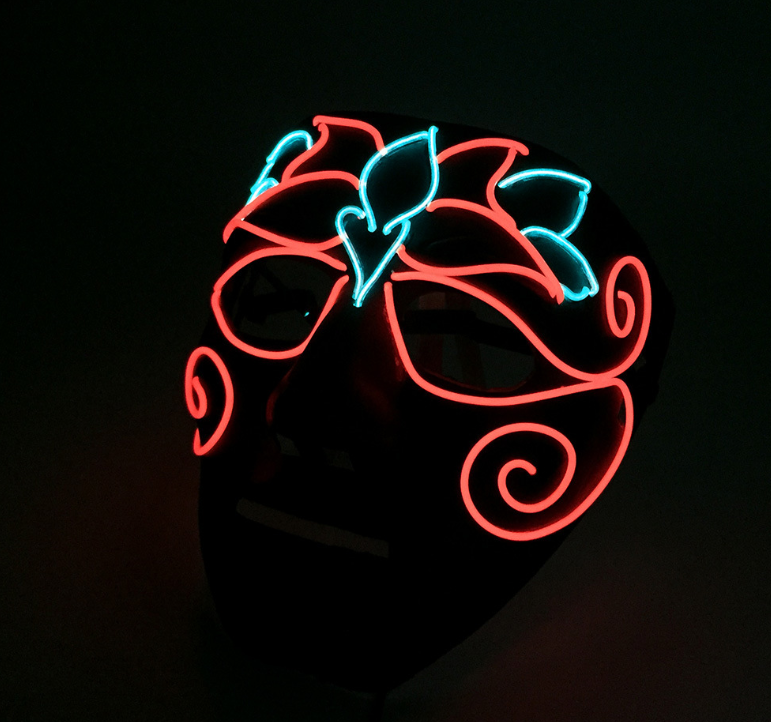 Blossom Swirl LED neon rave mask glowing in the dark