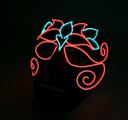 Blossom Swirl LED neon rave mask glowing in the dark