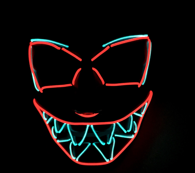 Shark Grin LED neon rave mask glowing in the dark